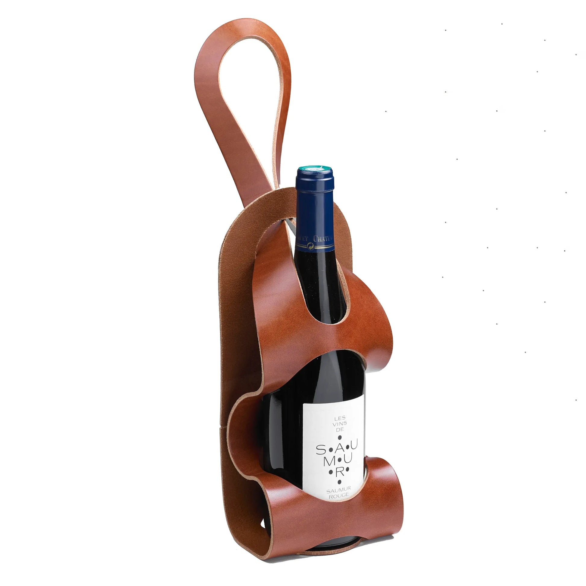 Bouteille de vin dans un porte bouteille pour vélo en cuir couleur cognac