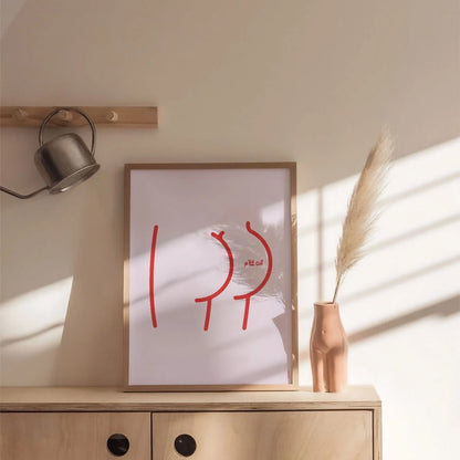 Affiche décorative Studio Topo Ptit Cul encadrée dans un cadre de 30x40cm