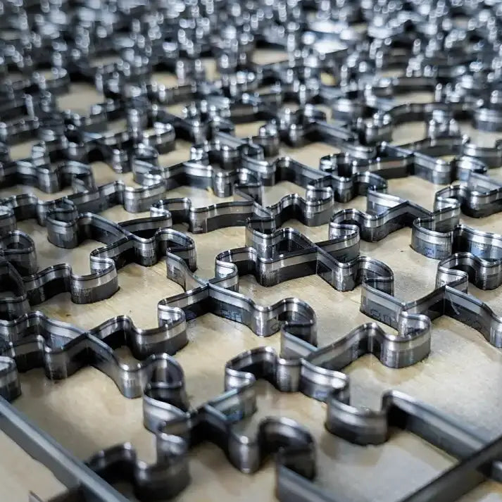 Outils de découpe des pièces de puzzle